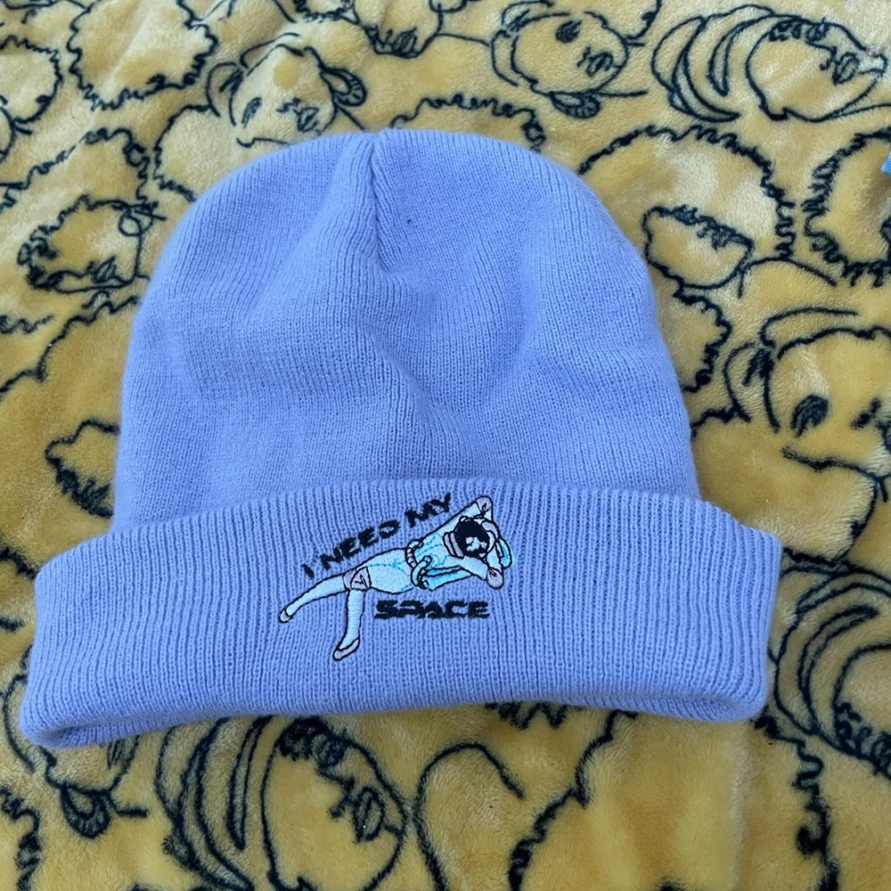 Cute purple beanie where you can show the i need space logo or just all purple!